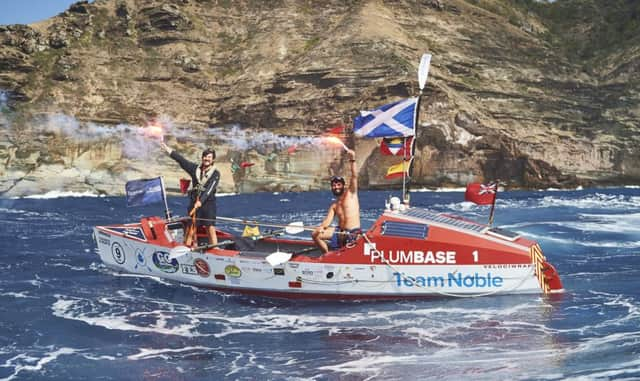 The Elliot brothers celebrate in Antigua after completing the Talisker Whisky Atlantic Challenge. Picture: Ben Duffy