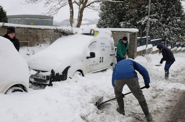 Snow in the Kirk Wynd in Selkirk on Thursday. Neighbours are being asked to pitch in to help clear pavements