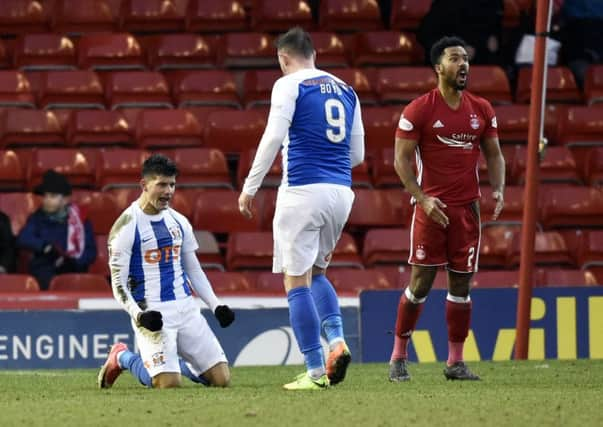 Kilmarnock's Jordan Jones (left) celebrates the award of a penalty. Picture: SNS