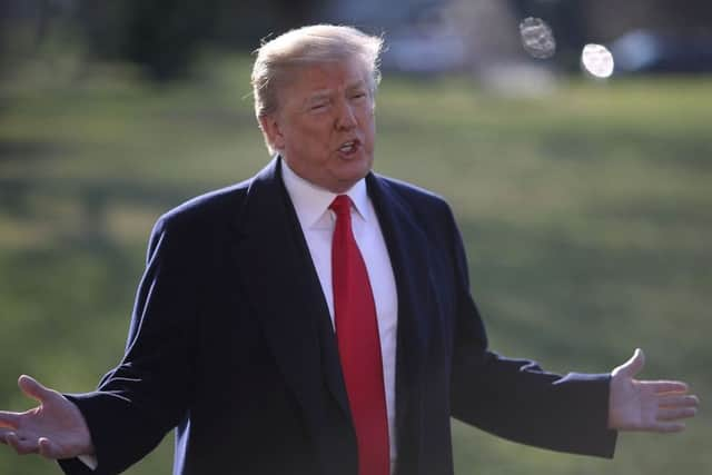 U.S. President Donald Trump answers questions from the media after his firing of Secretary of State Rex Tillerson before departing from the White House. Picture; Getty