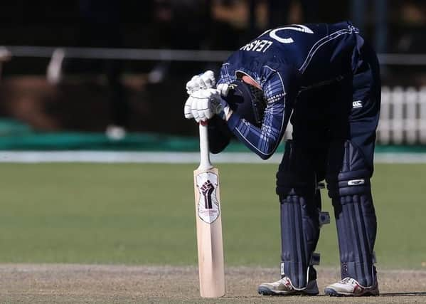 Despair for Michael Leask as his unbeaten 28 wasnt quite enough for Scotland to beat hosts Zimabwe in Bulawayo. Picture: ICC/Getty