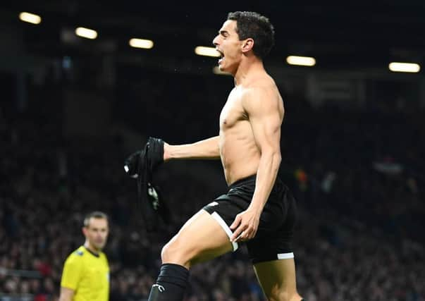 Wissam Ben Yedder pulls off his shirt in celebration after scoring Sevillas second goal. Picture: Getty.