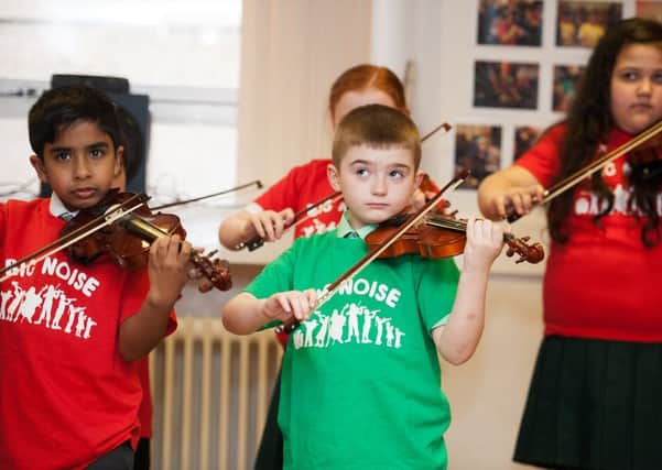 Children perform with the Big Noise project in Raploch, Stirling (Picture: John Devlin)