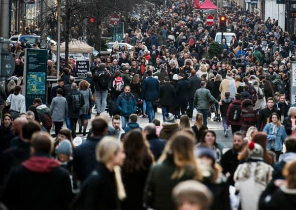 Scotlands population reached a record high in June 2016 but there are concerns a cut in migration figures would see the level drop. 
Picture: John Devlin