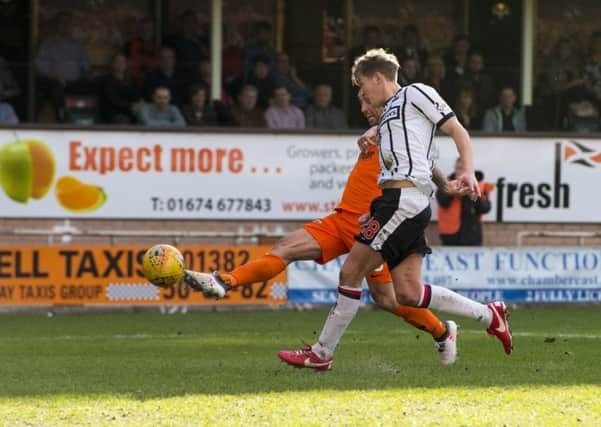 Scott McDonald scores for Dundee United. Picture: SNS/Ross Parker