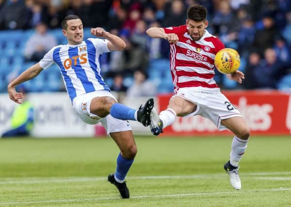 Kilmarnock's Gary Dicker (L) in action against Hamilton's Antonio Rojano. Picture: SNS/Roddy Scott