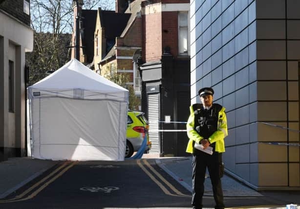 Police at the scene in Link Street, Hackney, east London after a man in his 20s died after being stabbed. Pic: Stefan Rousseau/PA Wire