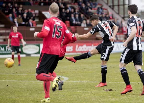 Kyle Magennis gives St Mirren the lead. Picture: SNS/Roddy Scott