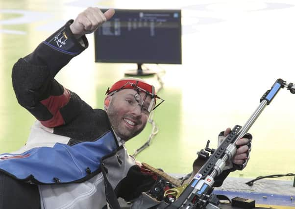 Neil Stirton of Scotland reacts after winning the silver medal. Picture: AP