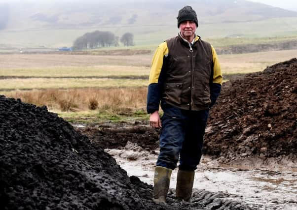 John Davidson with deliveries of the TH cakes at the Penicuik Estate. Picture: Lisa Ferguson