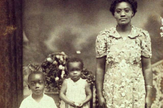 Palmer as a child (left) with his mother Ivy and his brother Trevor