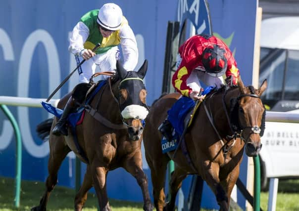 Vicente, ridden by Sam Twiston-Davies, wins last year's Coral Scottish Grand National. Picture: Craig Watson/PA