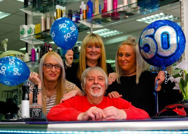 Dennis wilson with staff members l to r: Lissa Bow, Anne Walker and Linzi Naismith.