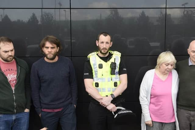 Scott Hutchison's family at a police press conference. Picture: Greg Macvean