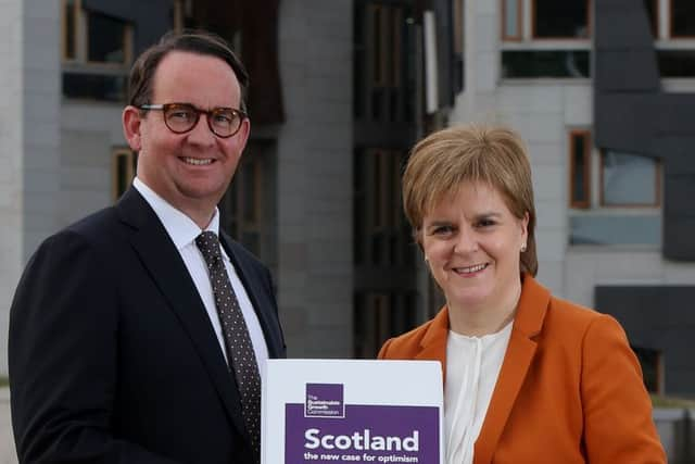 Andrew Wilson and Nicola Sturgeon with the Growth Commission. Photograph: PA