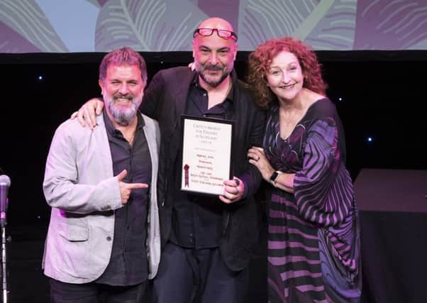 Presenter actress Blythe Duff pictured with Best Production winners Oguz Kaplangi Rhinoceros music Composer and Rhinoceros Director Murat Daltaban. Picture: Graeme Hart