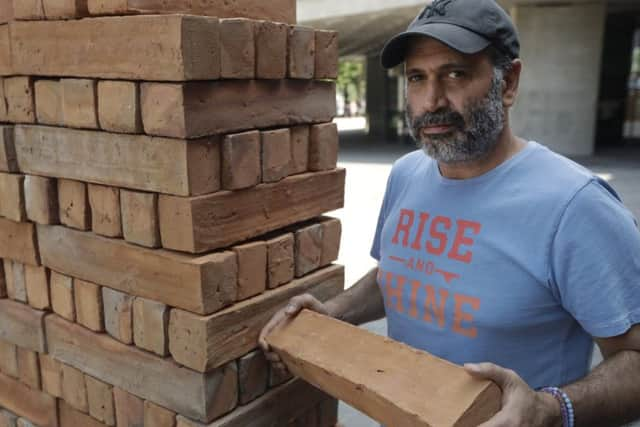 Mexican artist Bosco Sodi with his installation Muro (wall) in London, in response to Donald Trump's plan for a barrier on the Mexican border