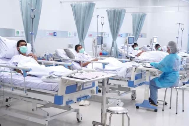 This photo grab shows members of the "Wild Boars" football team being treated at a hospital in Chiang Rai. Picture: Getty Images