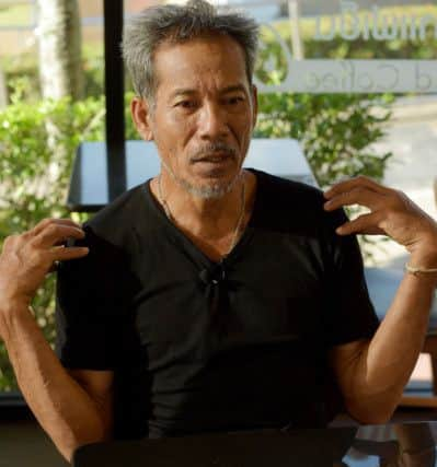 Commander Chaiyananta Peeranarong, a former Thai Navy SEAL who took park in the rescue operation for the 12 boys and their football coach at Tham Luang cave and was the last diver out of the cave, speaks during an interview at Chiang Rai airport. Picture: Getty Images