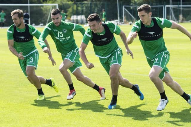 Steven Whittaker, trialist Ivan Lendric, John McGinn and Paul Hanlon are put through their paces ahead of tonights visit of Asteras Tripolis. Picture: SNS