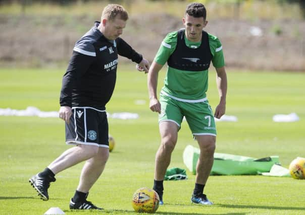 Hibernian manager Neil Lennon in training with John McGinn. Picture: Paul Devlin/SNS