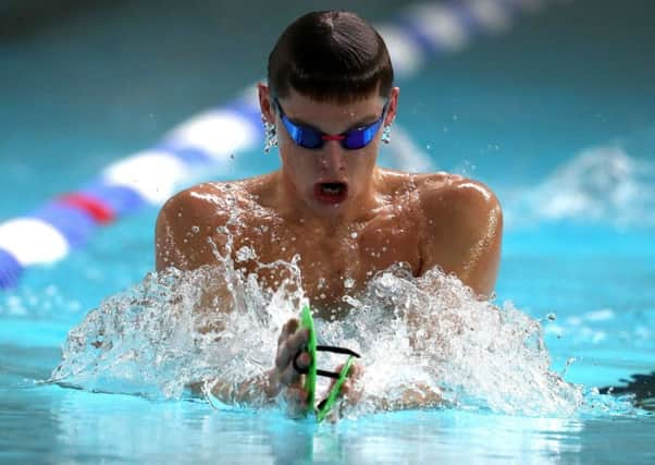 Scotlands multiple Commonwealth champion Duncan Scott got in some training at Stirling ahead of the European Championships. Picture: PA.