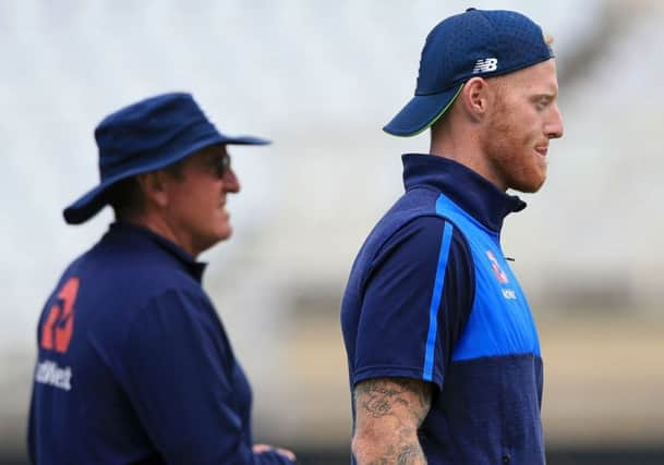 Englands Ben Stokes, right, and head coach Trevor Bayliss at yesterdays practice session ahead of the third Test at Trent Bridge. Picture: AFP/Getty