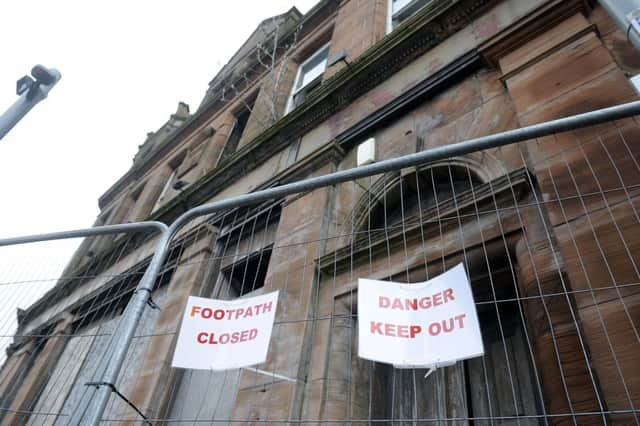 The former Big Bar in Bainsford, Falkirk, is one of a number of buildings to have lain empty for several years. Picture: Michael Gillen