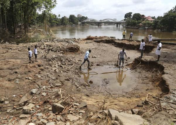 Devastating floods in Kerala, India left more than 200 people dead and sent more than 800,000 fleeing for dry land. Picture: AP Photo/Aijaz Rahi