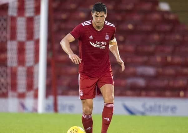 Scott McKenna in action for Aberdeen. Picture: