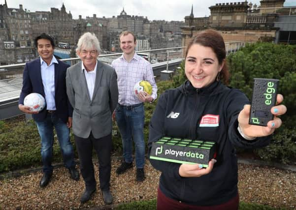 L-R: Roy Hotrabhvanon, CEO at PlayerData; Mel Young, co-founder of The Homeless World Cup; Hayden Ball, CTO at Playerdata; and Mariana Mercado, volunteer manager at The Homeless World Cup. Picture: Stewart Attwood