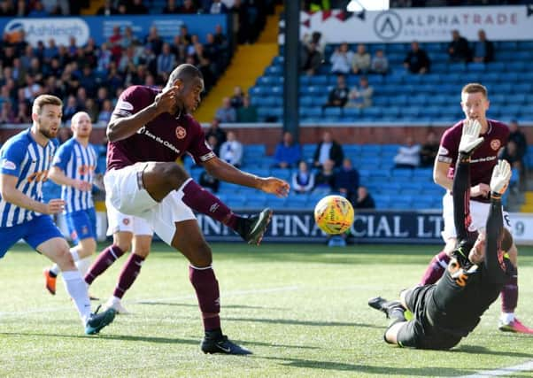 Jamie MacDonald saves a shot from Uche Ikpeazu. Pic: SNS/Craig Williamson