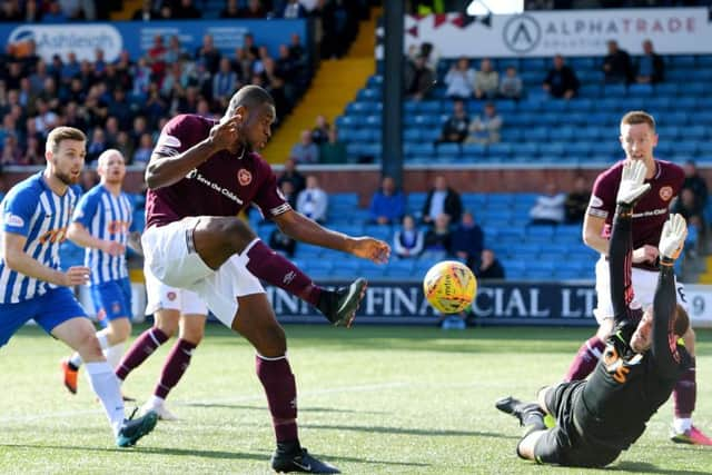 Kilmarnock goalkeeper Jamie MacDonald saves this effort from Uche Ikpeazu but the striker scored Hearts winner with nine minutes left. Picture: SNS.