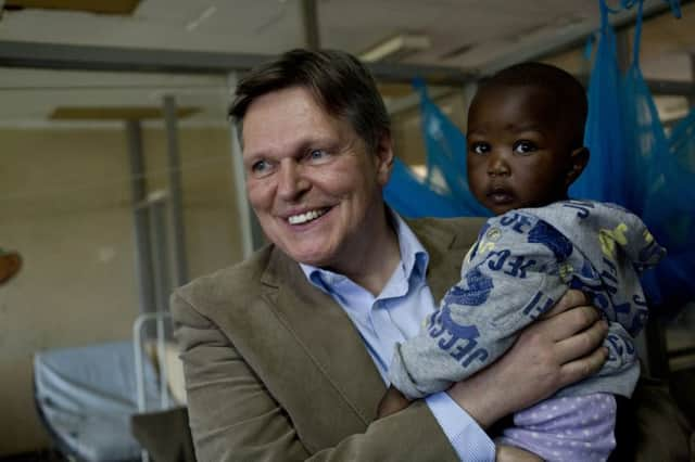 Stephen Kerr visits children affected by malaria in the paediatric ward in Siaya hospital, Kenya. Photograph: Karel Prinsloo/Malaria No More