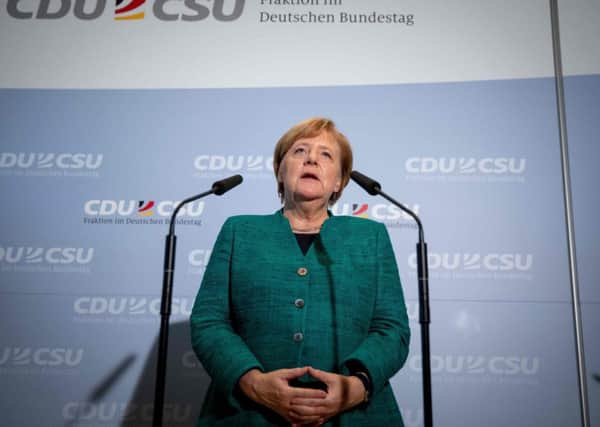 German Chancellor Angela Merkel arrives to make a statement in the parliamentary compound of the Bundestag in Berlin. Picture; Getty