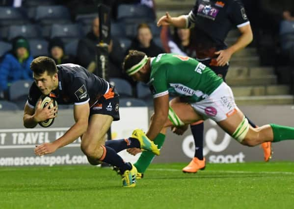 Blair Kinghorn crosses for Edinburghs third try against Benetton at Murrayfield.  Picture: SNS/SRU