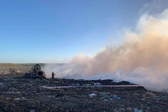 Fire at the Cambridge landfill site where the body of missing airman Corrie McKeague is believed to be buried. Picture: SWNS