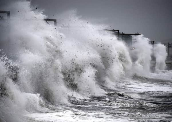 Waves crash against the sea wall as Storm Callum hits the seafront on October 12, 2018 in Saltcoats.  (Photo by Jeff J Mitchell/Getty Images)