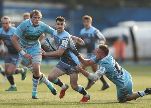 The two sides took to the field wearing light blue kits. Picture: PA