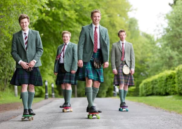 Glenalmond College Reids boys skateboarding down Back Avenue.