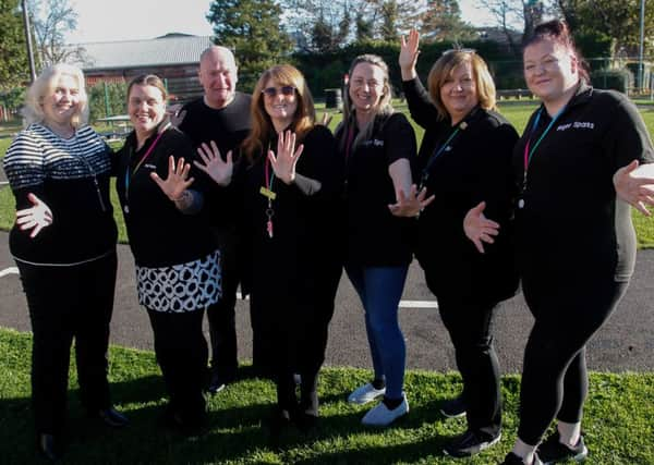 Staff at Bright Sparks centre in Bonnyrigg with Janet Morton, National Officer for BBC Children In Need Scotland and Cllr Derek Milligan.