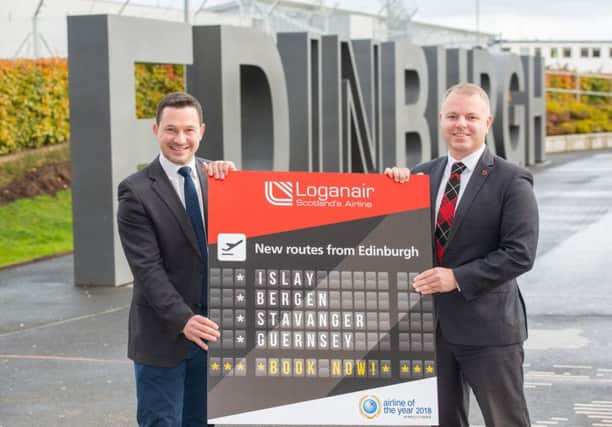 Jonathan Rayner of Edinburgh Airport and Loganairs MD Jonathan Hinkles unveil the routes. Picture: Contributed