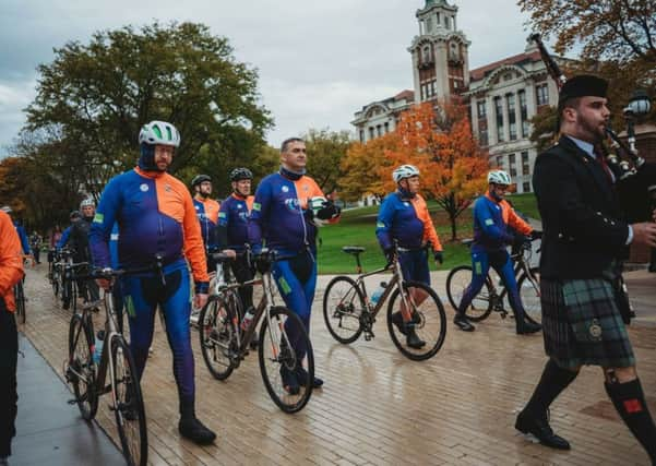 Bute man Brian Asher (beard and glasses), headteacher at Lockerbie High, was among the party cycling to Syracuse.