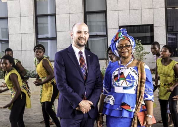 Scottish Government Minister Ben Macpherson MSP is greeted at the conference by Dr Ann Phoya, Chair of the Malawi Scotland Partnership