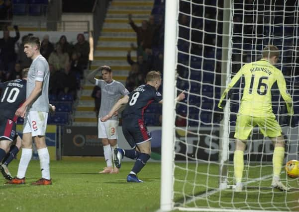 Jamie Lindsay runs off to celebrate after scoring for County. Pic: SNS/Garry Williamson