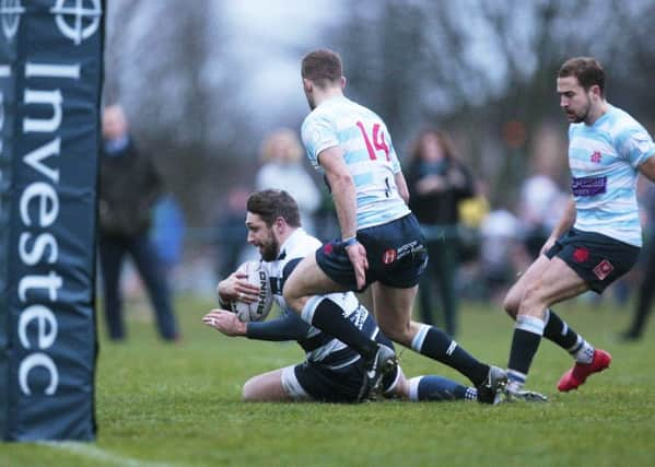 Craig Robertson crosses the Accies line to put the icing on the cake of a comfortable win for Heriots. Picture: Graham Stewart/SNS/SRU