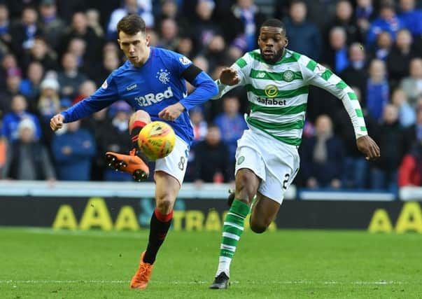 Rangers' Ryan Jack holds off Celtic's Olivier Ntcham. Pic: SNS/Craig Foy