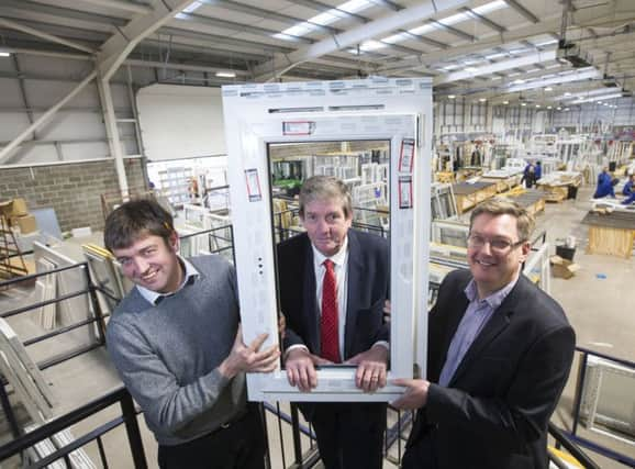 L to R: Martin Smith and Robert McKnight of Scotia Double Glazing with Scott Webb, UKSE. Picture: Jeff Holmes