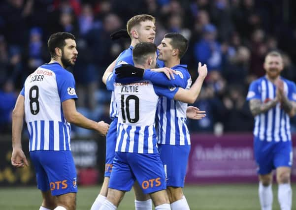 Kilmarnock's Stuart Findlay (centre) celebrates his goal. Pic: SNS/Rob Casey