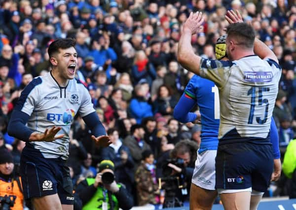 Scotland's Blair Kinghorn celebrates his opening try with team mate Stuart Hogg. Pic: SNS/Craig Williamson